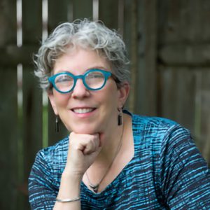Person looking at camera wearing glasses